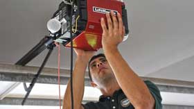 Technician Installing Opener