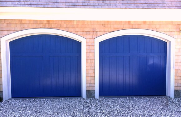 Royal blue vinyl composite garage door