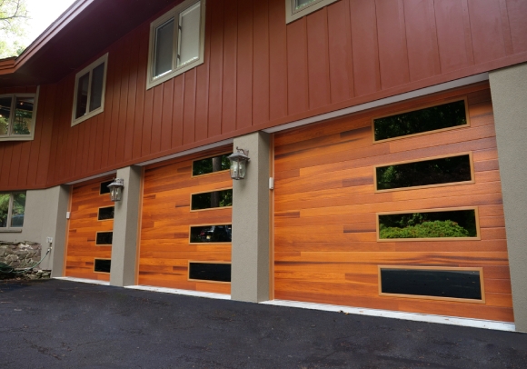 planks style garage door with mosaic windows
